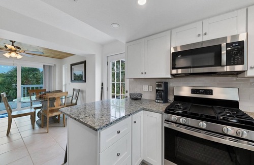 Palm Island House | Palm Island Cove: Your oasis near the beach! 3 Bedrooms, 1.5 baths and spacous outdoor shower!
