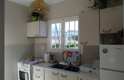 Phocis Region House | Palm tree house by the beach