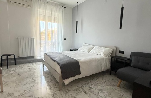 Magna Grecia Bed & Breakfast | Panta Rei Charming Rooms and Spa bright Iris room with balcony