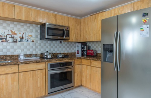 Orange Bay House | Paradise at Little Bay Cournty Club