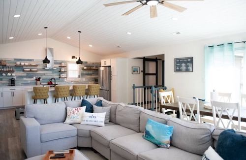 Bumpass House | Paradise at Sunset Point: hot tub, waterfront and dog friendly property