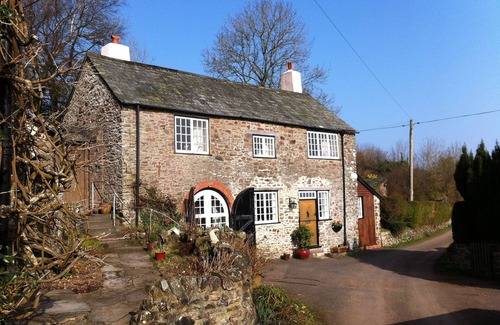 Culbone Cottage | Parsonage Farm Stables, with stunning views down to the sea