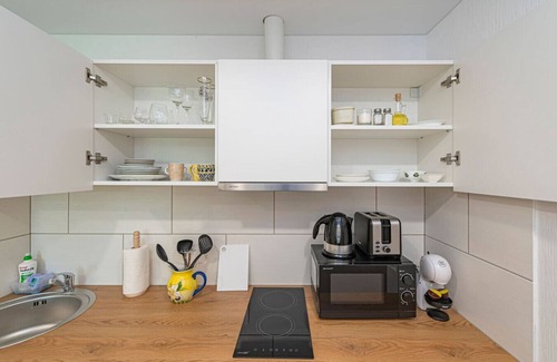 Kaunas Apartment | Partizanų studio ap 1 by Polo Apartments