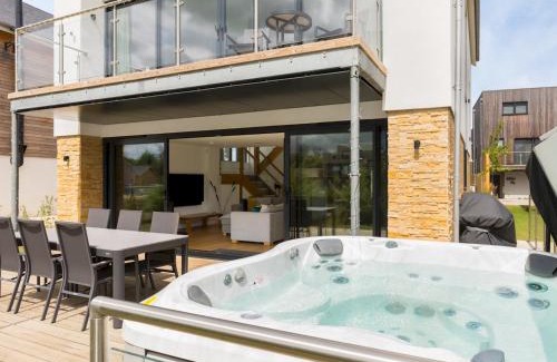 Cirencester House | Pass the Keys Minety Lake lodge hot tub games room