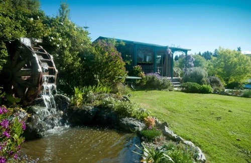 Ruby Bay House | Peaceful Comfortable Cottage in Beautifully Landscaped Garden