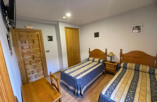 Olvega House | Pensión El Gallo