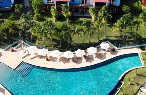 Le Francois House | Penthouse Tropic Lagoon, accès au lagon