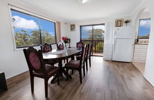 Lakes Entrance House | Perched on a slope, this retreat offers views of the ocean in the distance