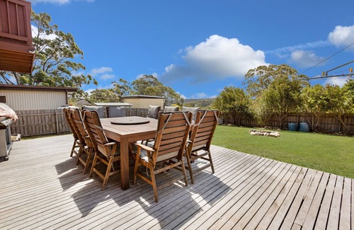 Lakes Entrance House | Perched on a slope, this retreat offers views of the ocean in the distance
