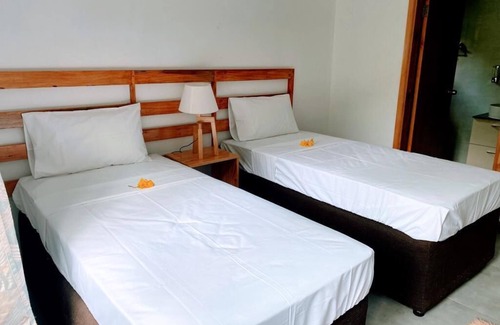 Anse Royale Apartment | Perfect for families to relax to the sound of bamboo, 5 mins walk to the beach