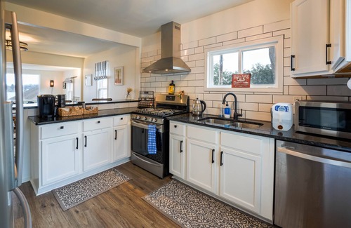 Tichigan House | Pet Friendly 2 Lakefront Cottages with Pontoon Boat, Kayaks, Firepit and Sandbar