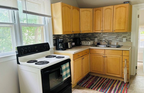 Ypsilanti Apartment | Pet-Friendly Historic Stay I Near Fold Lake, Depot Town & 10 Mins to Ann Arbor