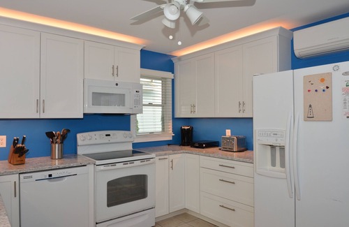 The Pines House | Pet Friendly North Rehoboth Ocean Block 5BR Home Steps to the Beach w/Large Porch