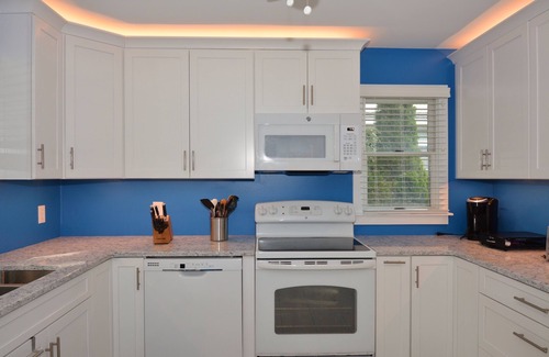 The Pines House | Pet Friendly North Rehoboth Ocean Block 5BR Home Steps to the Beach w/Large Porch