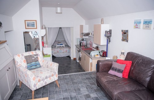 Sandhaven Cottage | Pew with a View - Pet Friendly seafront cottage, secure shorefront garden