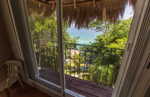 Yucatan Peninsula Villa | PICTUREQUE VILLA IT'S OWN PRIVATE COVE LAKE DOCK Palapa Swings Kayaks SUP Boards