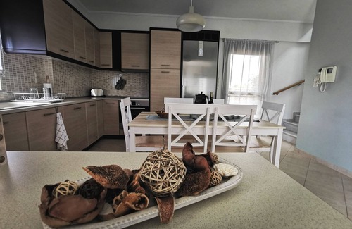 Kalyvia Thorikou House | Pine Grove House - We make you feel like home!