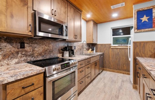 Dripping Springs Apartment | Ping Pong and Foosball; kitchen and bathrooms shared amenities