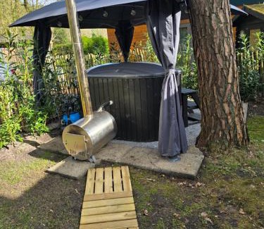 Lanaken Ski Chalet | pipowagen met prive Hot tub