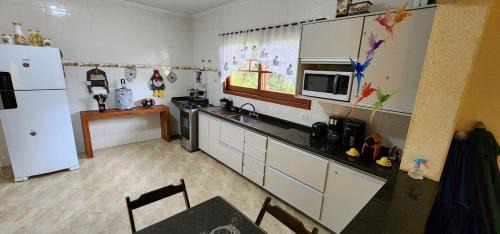 Caiocara House | Piscina Climatizada em condomínio - Atibaia SP
