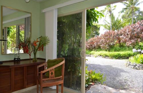 Haiku House | Plumeria Room on a Lush Farm on Maui's North Shore