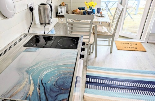 Eriskay Ski Chalet | Pod Beag beside the sea, Isle of Eriskay