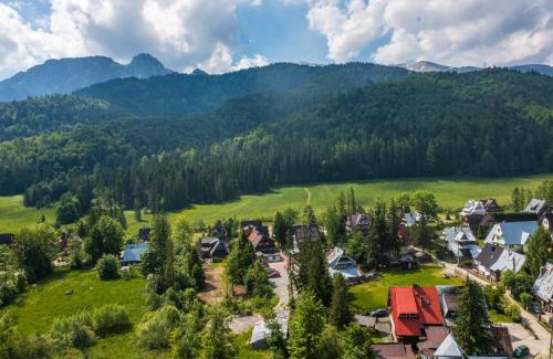 Zakopane House | Pokoje z widokiem na góry i Prywatny Domek z zadaszoną altaną - grillem i ogniskiem.