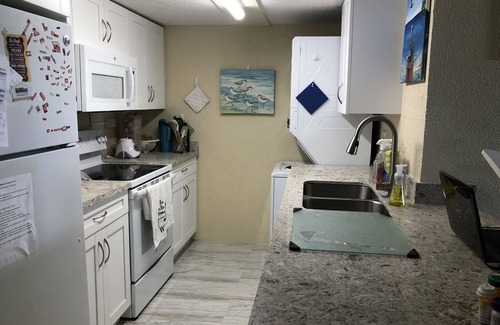 La Grande Princesse Condo | Pool and Swaying Palms with a view