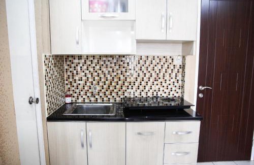 Pekayon Jaya Apartment | Pool View 2BR Mutiara Bekasi Apartment By Travelio