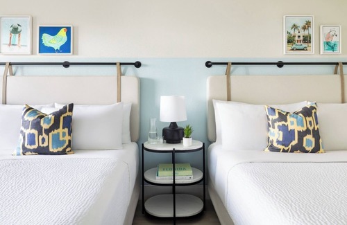 New Town Hotel | Poolside Paradise l Fire Pits, Lawn Games, Live Music & Endless Fun