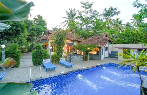 Kovalam House | Pop Tavern Kovalam Beach Villa by VOYE HOMES