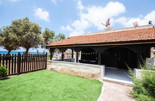 Haifa Apartment | PORT CITY - Beach Front Haven - 2 Bdrms W Garden