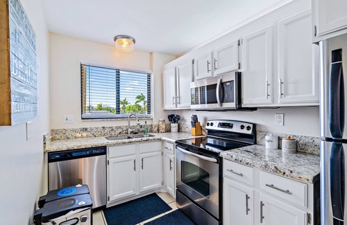 Bella Vista Condo | Practically on the beach; short walk across Carlin Park to the sand! ❤️💛💚