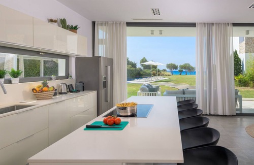 Soroni Villa | Prime Beach Front Luxury Villa with Private Tennis Court and 90m2 Infinity Pool