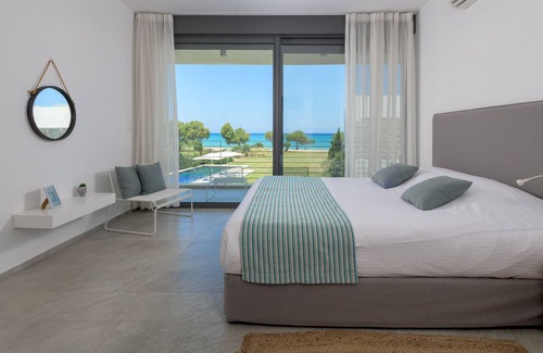 Soroni Villa | Prime Beach Front Luxury Villa with Private Tennis Court and 90m2 Infinity Pool