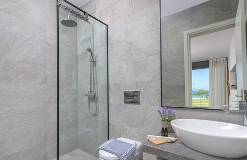 Soroni Villa | Prime Beach Front Luxury Villa with Private Tennis Court and 90m2 Infinity Pool