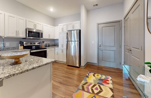 Coliseum Central Apartment | Prime Hampton Stay at Ellipse Urban: Near Shopping, Dining and Entertainment