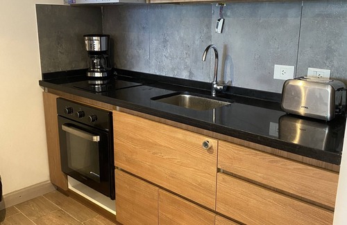 Belgrano Apartment | Prime location, amazing lake view. World class Skiing, hiking & exploring. n