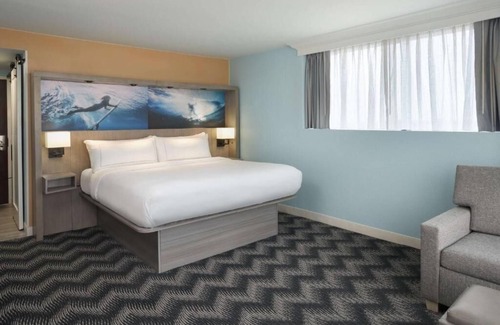 Cocoa Beach Hotel | Prime Location! Outdoor Pool! Parking, Walk to Beach! Tiki Bar!