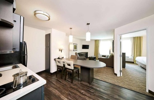 Schiller Park Hotel | Prime Location! TWO Spacious 1BR Suites with Kitchens, Free Airport Shuttle!