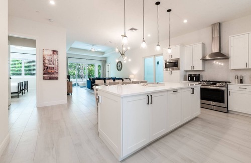 West Bay Condo | Private 7 Mile Beach Beach Club. Ocean views from Roof Terrace and Pool Pavilion