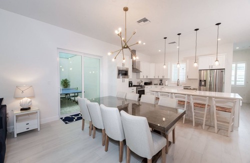 West Bay Condo | Private 7 Mile Beach Beach Club. Ocean views from Roof Terrace and Pool Pavilion