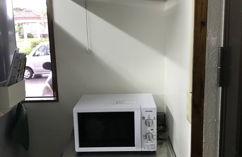 Nago House | Private accommodation for rent on the ground floor in a nice environment (kitchenette + bedroom + living room + private toilet/shower)