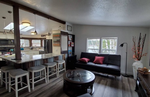 Priest River House | Private Cove River Home with water toys, 200 foot sandy beach and boat dock.
