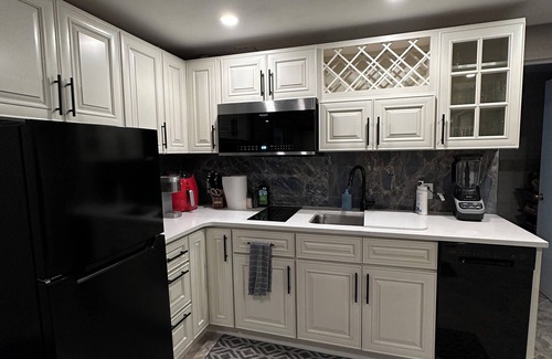 Aurora Apartment | Private entrance and outside patio. Centrally located in a quiet neighborhood.