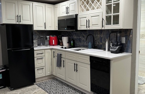 Aurora Apartment | Private entrance and outside patio. Centrally located in a quiet neighborhood.