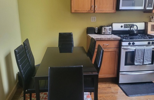 Central Park North Apartment | Private floor with outside balcony in a Harlem Brownstone