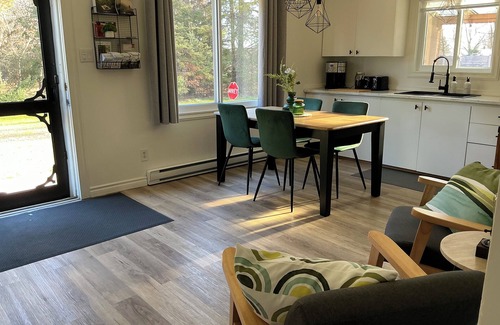 Bromont Apartment | PRIVATE FOREST WITH PATHS AND POND ON THE DOORSTEP. YOUR DOG OFF-LEASH EVERYWHERE.