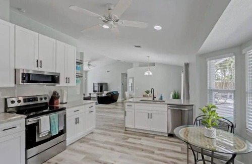 Royal Palm Beach House | Private Home with Oasis Backyard w/Pool, BBQ, King Beds
