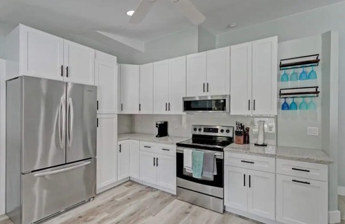 Royal Palm Beach House | Private Home with Oasis Backyard w/Pool, BBQ, King Beds